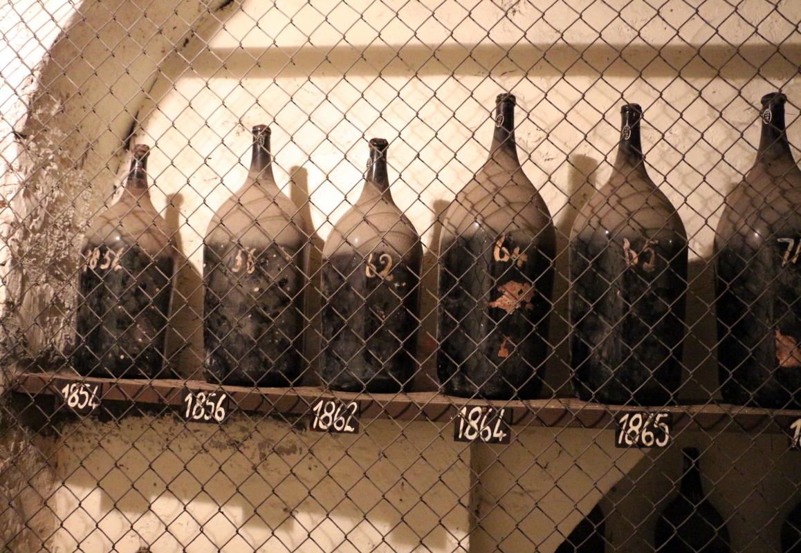 Imola, palazzo tozzoni, cantine, bottiglioni di vino dal 1845 al 1910, 01 - Sailko