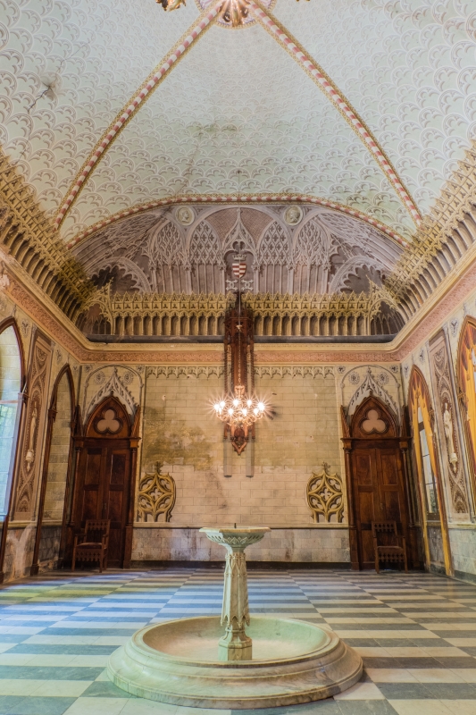 Roccolo Castle - hall with a fountain - ENIT SpA
