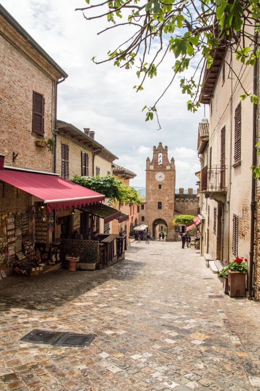 Gradara, via Umberto I; at the end of the street the Clock Tower - ENIT SpA