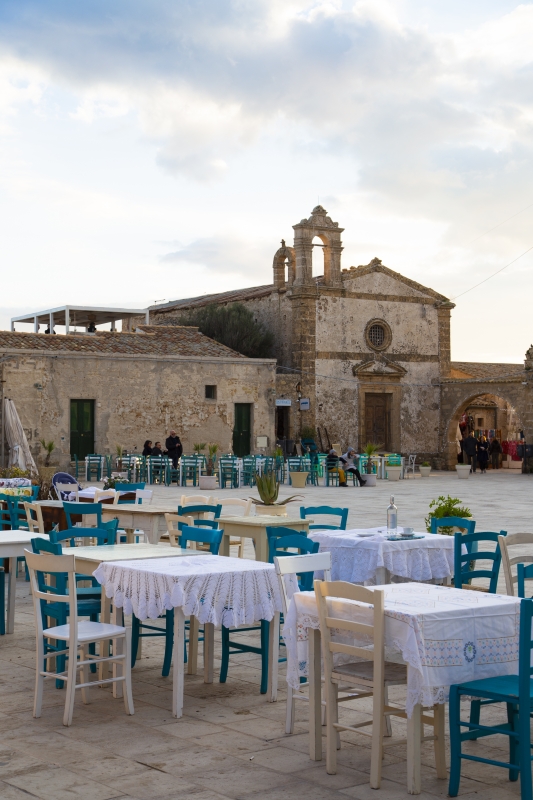 Typical restaurant in Marzamemi  and the San Francesco Di Paola church - Simone Antonazzo / ENIT SpA