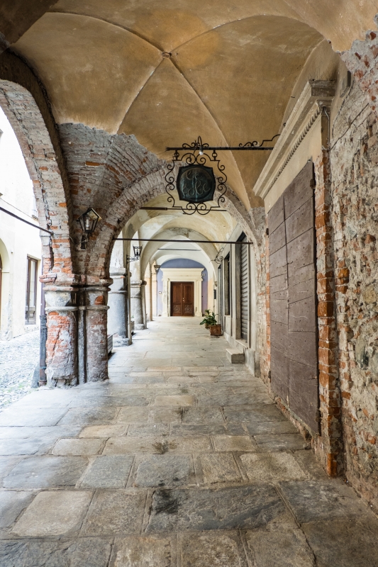 Portico in the village of Avigliana - ENIT SpA