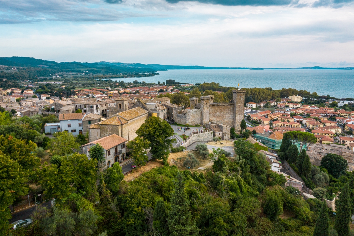 Panoramic view of Bolsena with the Rocca Monaldeschi della Cervara castle and Lake Bolsena - ENIT SpA