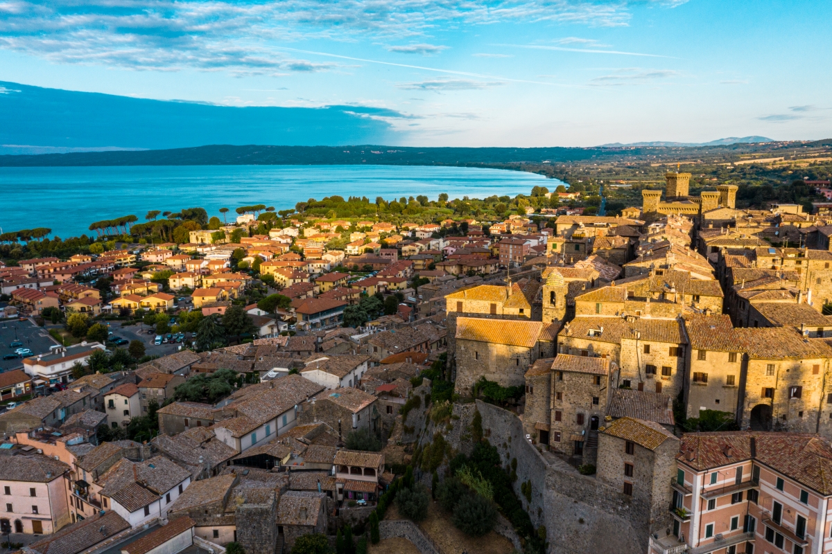 Panoramic view of the village of Bolsena and Lake Bolsena - ENIT SpA