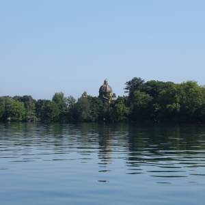 The Bisentina Island in Lake Bolsena. In the background, the Church and Convent of Saints Giacomo and Cristoforo. - Simone Antonazzo / ENIT SpA